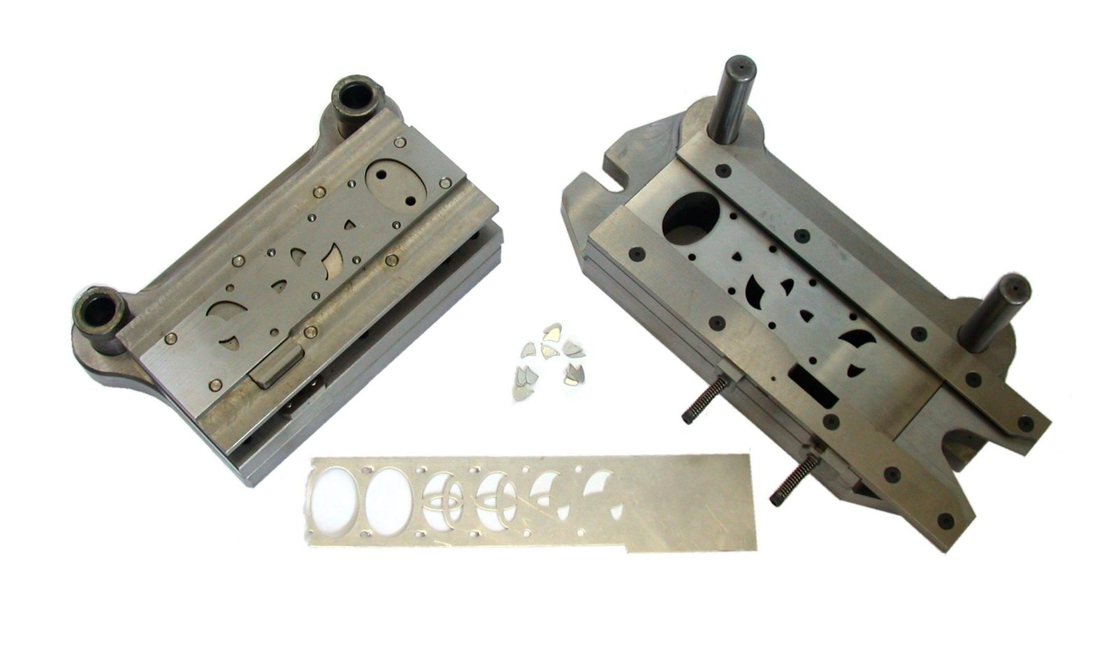 Steel progressive die and mould tooling components with stamped metal strip