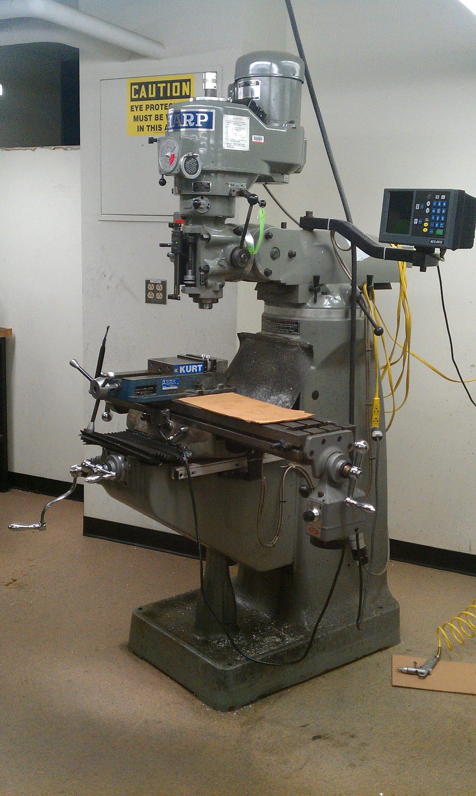 Precision CNC machining of a metal component on a vertical milling machine